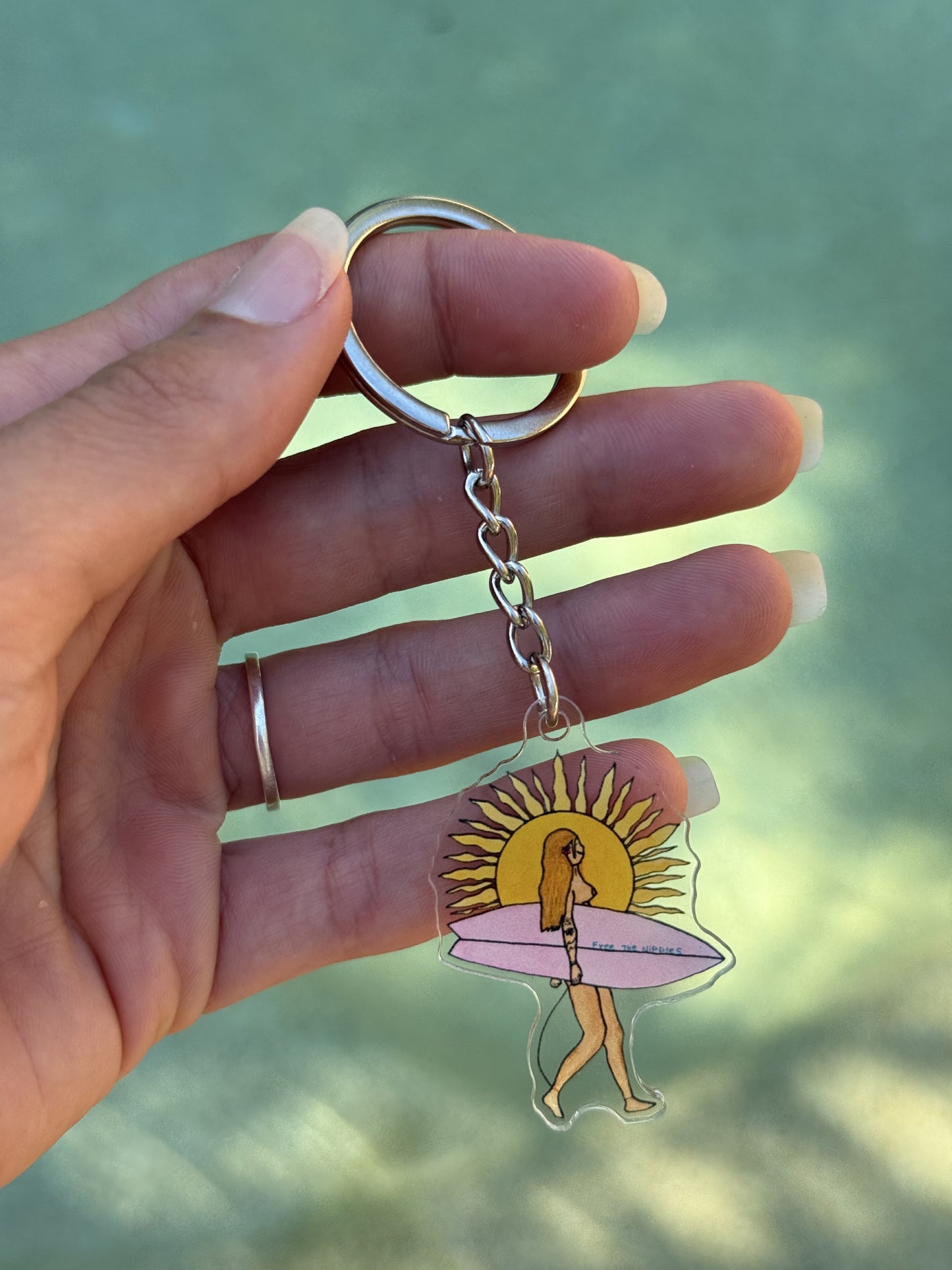 surf girl acrylic keyring